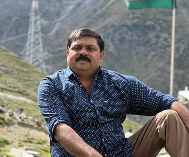 MANIL THOMAS